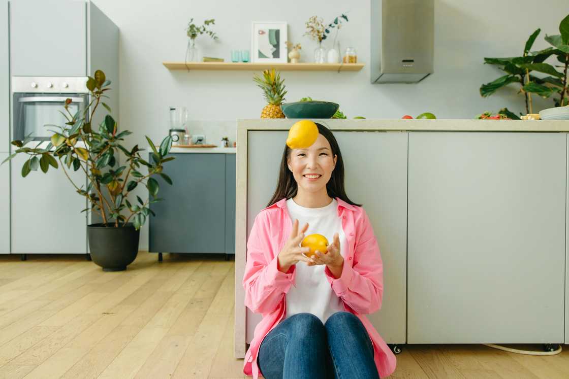A woman relaxing in the kitchen