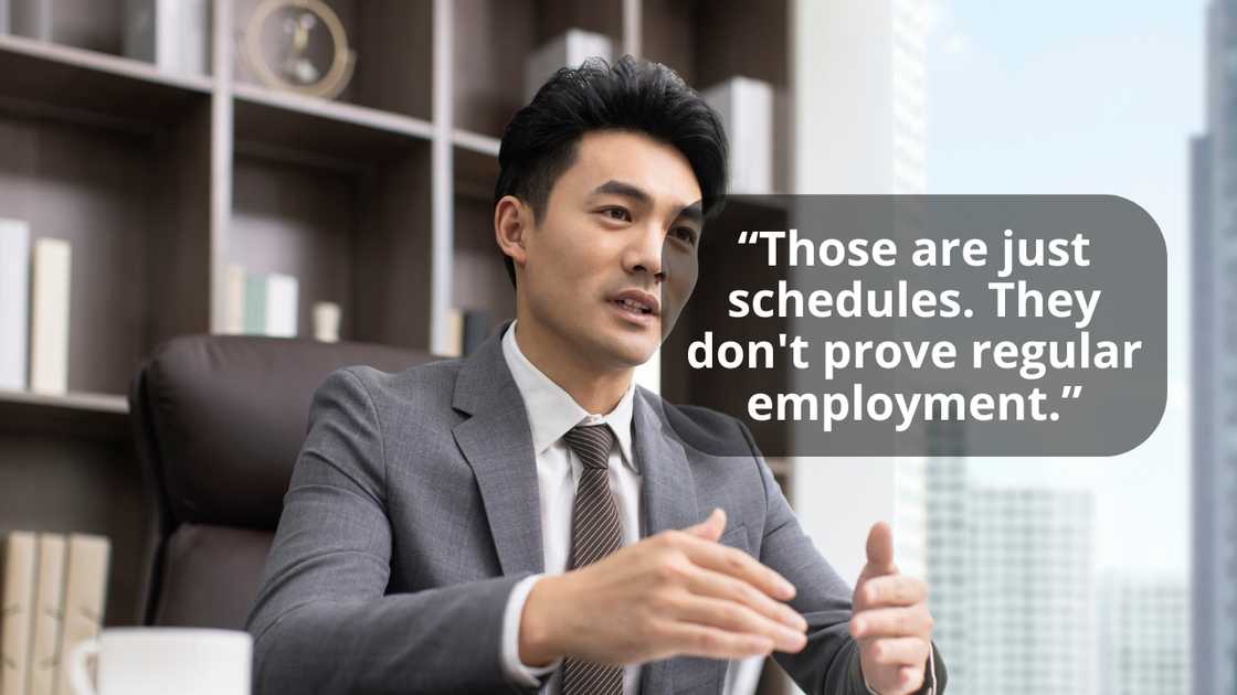 A lawyer in a serious conversation with a client in an office