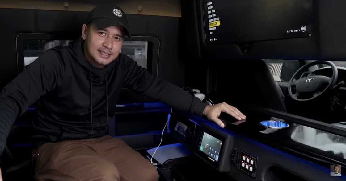 JM de Guzman shows off his luxurious van with bed, TV, cooler and closet (Screengrab from JM de Guzman's YouTube channel) JM de Guzman shows off his luxurious van with bed, TV, cooler and closet (Screengrab from JM de Guzman's YouTube channel)
