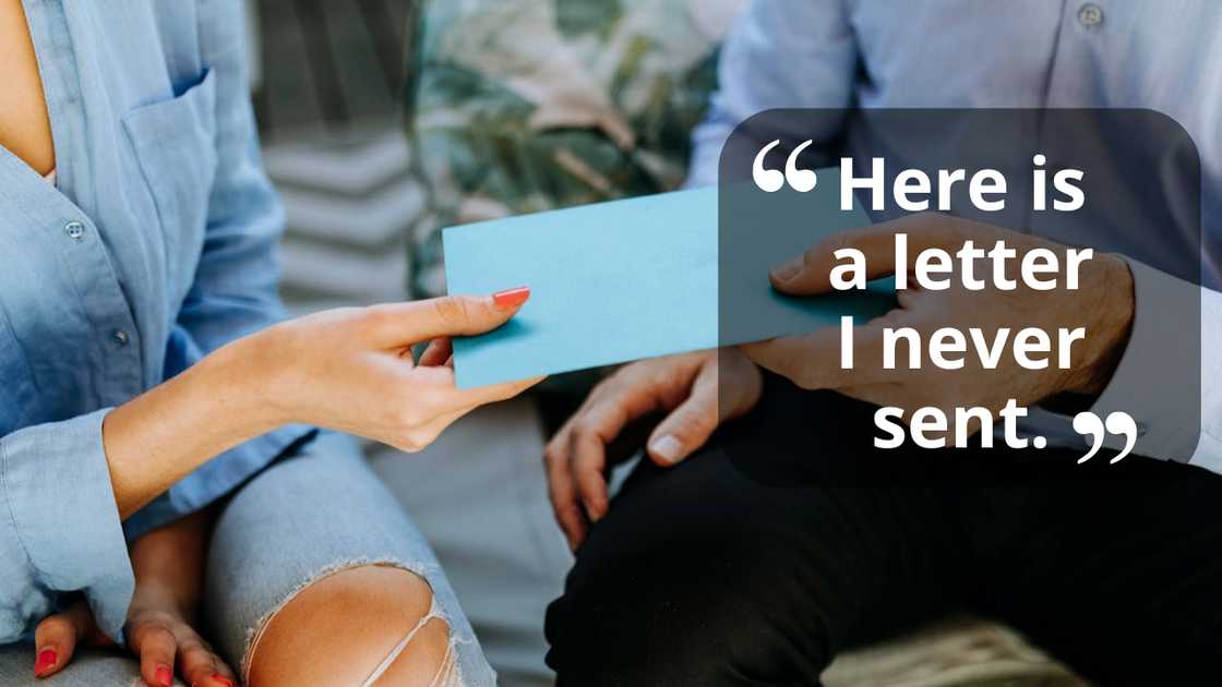 A person hands a blue envelope to another person. A person hands a blue envelope to another person.