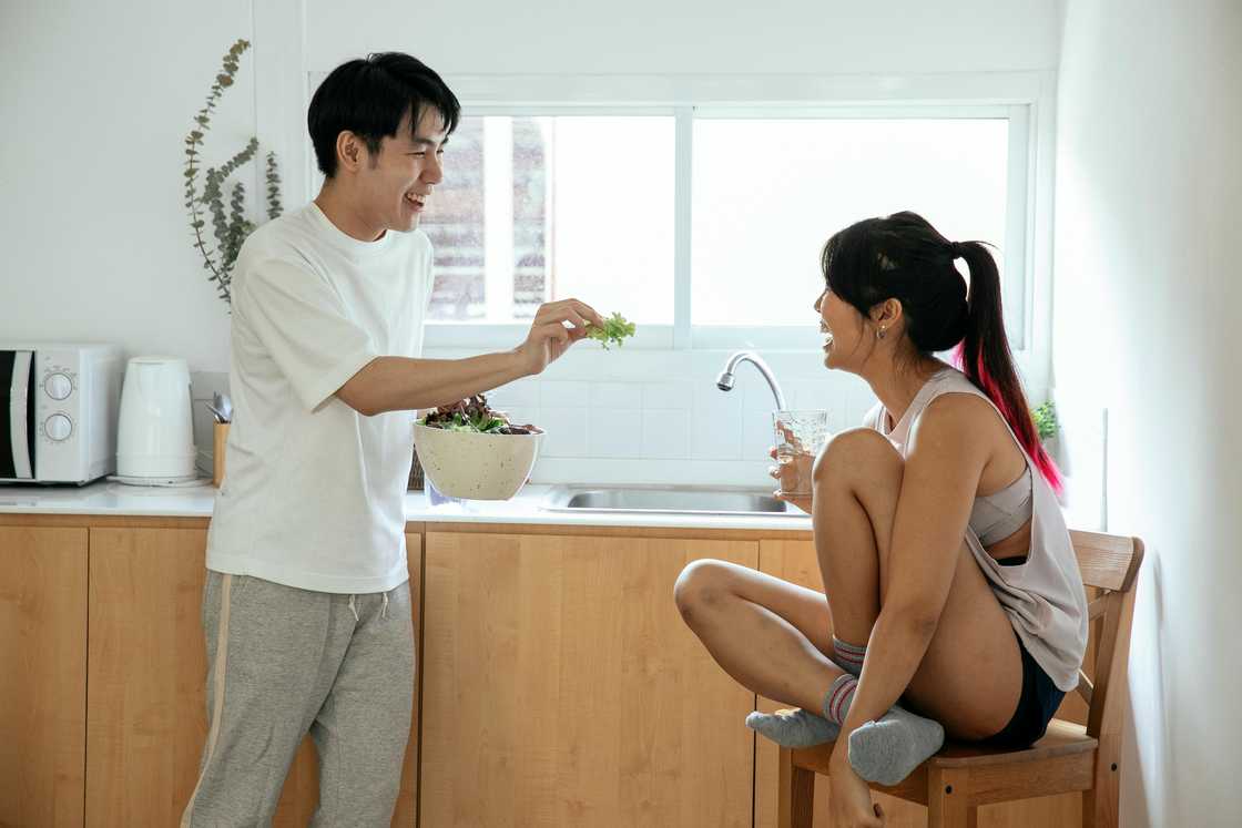 A couple in the kitchen