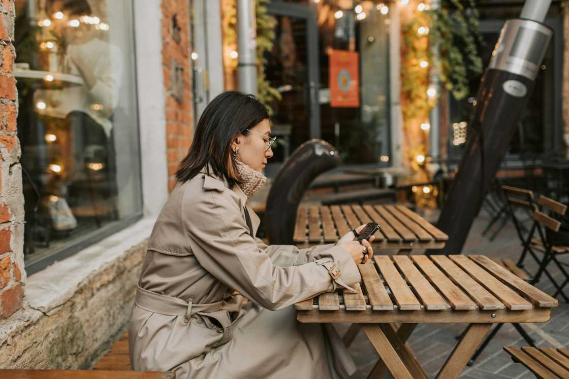 A woman checking her smartphone