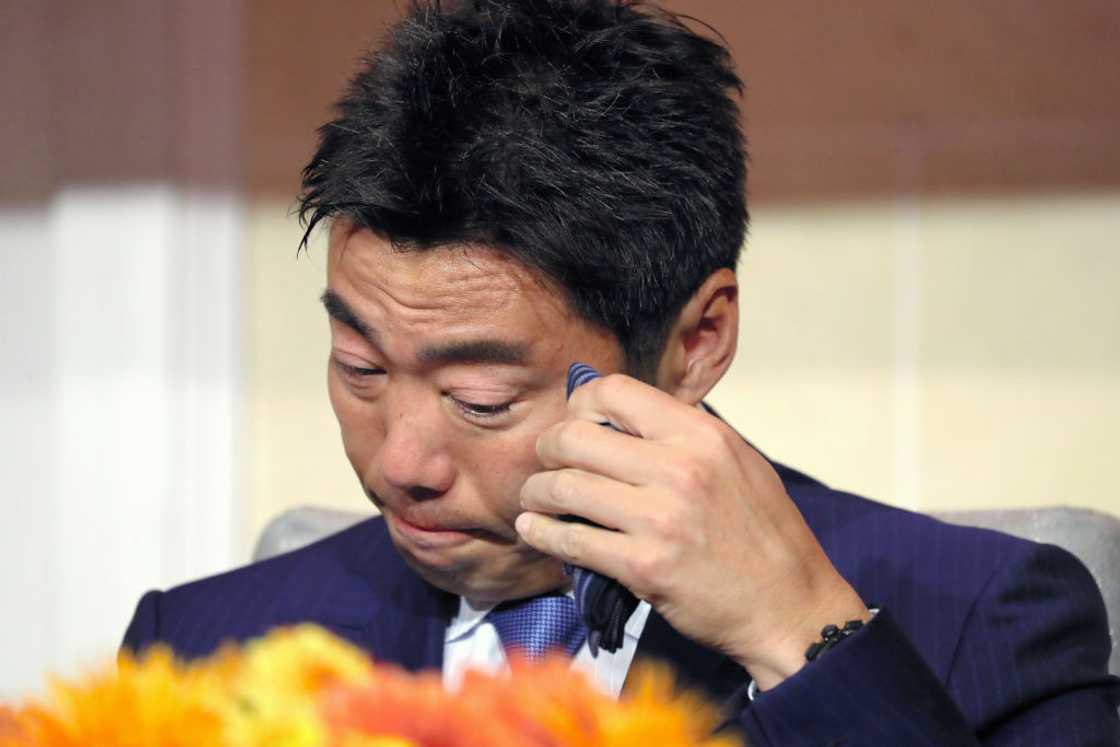 Asian man teary, emotional Asian man teary, emotional