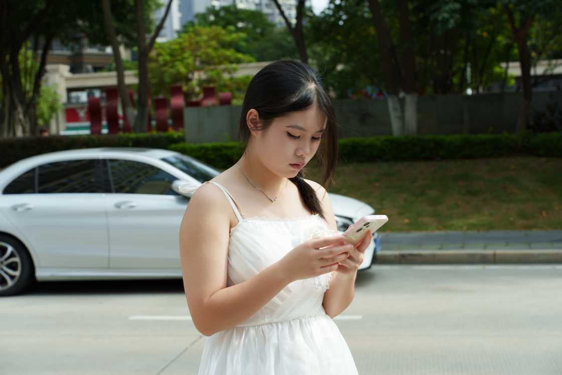 A woman looking at her phone A woman looking at her phone