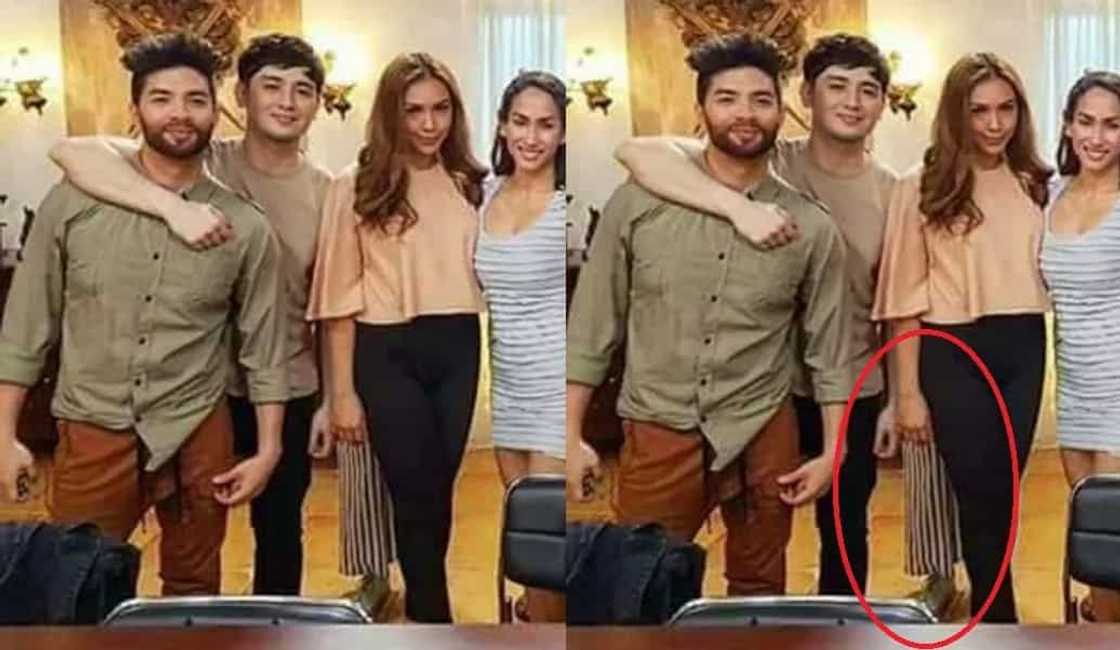 Something strange was captured in this group photo. Can you spot where the ghost is? Something strange was captured in this group photo. Can you spot where the ghost is?