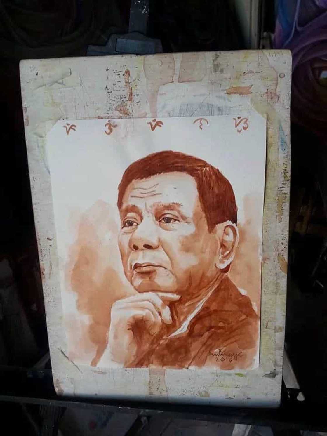 Duterte is painted by a Taclobanon artist using ‘tuba’
