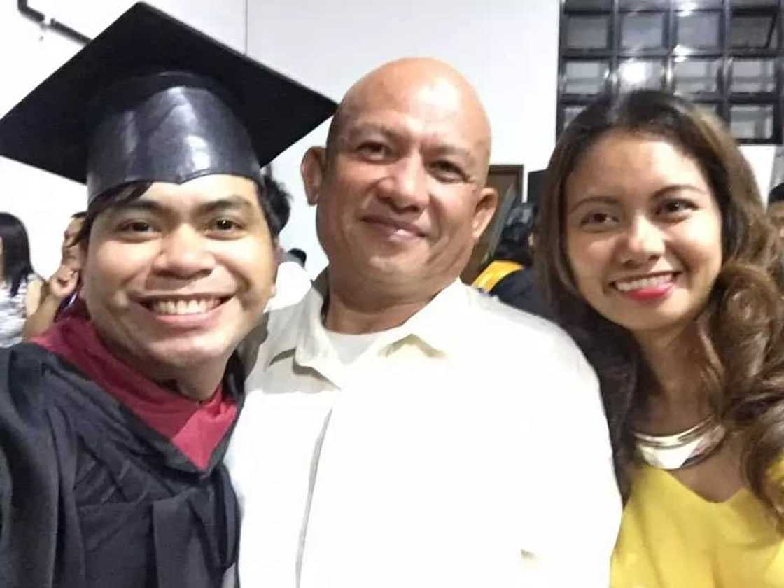 Security guard's daughter graduates cumlaude Security guard's daughter graduates cumlaude
