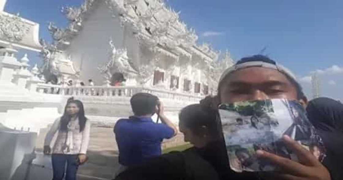 Boyfriend brings girlfriend's pictures to Thailand even after she died Boyfriend brings girlfriend's pictures to Thailand even after she died