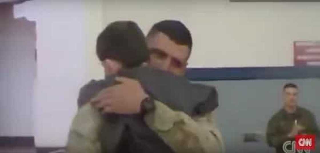 A boy with cerebral palsy walks to his Marine dad for the first time after not seeing him in over a year!