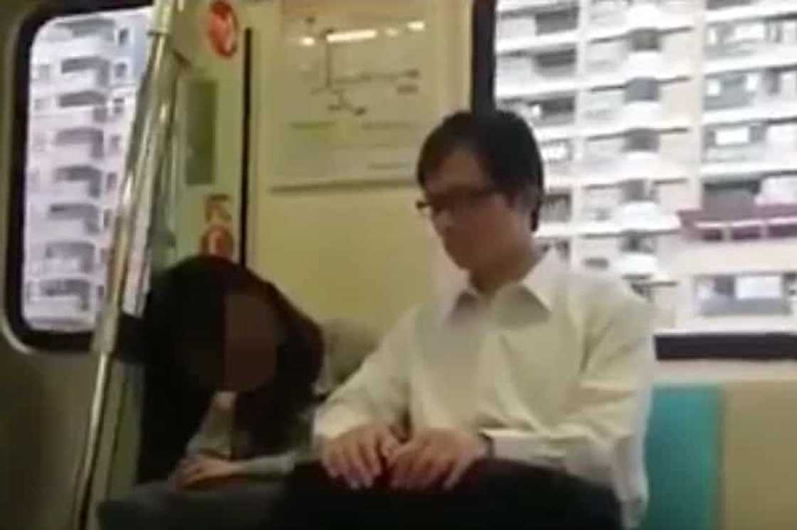 Chinese pervert fondles woman in train