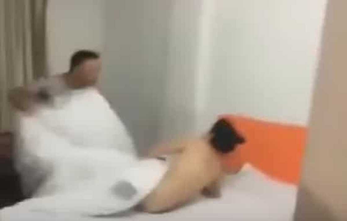 When the husband enter the room, he saw his woman sleeping in a bed. When the husband enter the room, he saw his woman sleeping in a bed.