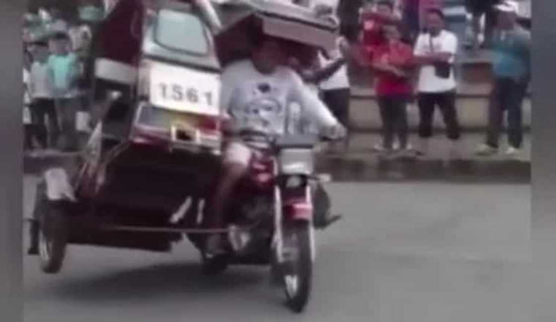 Pinoy tricycle driver impressed netizens with his dangerous tricks