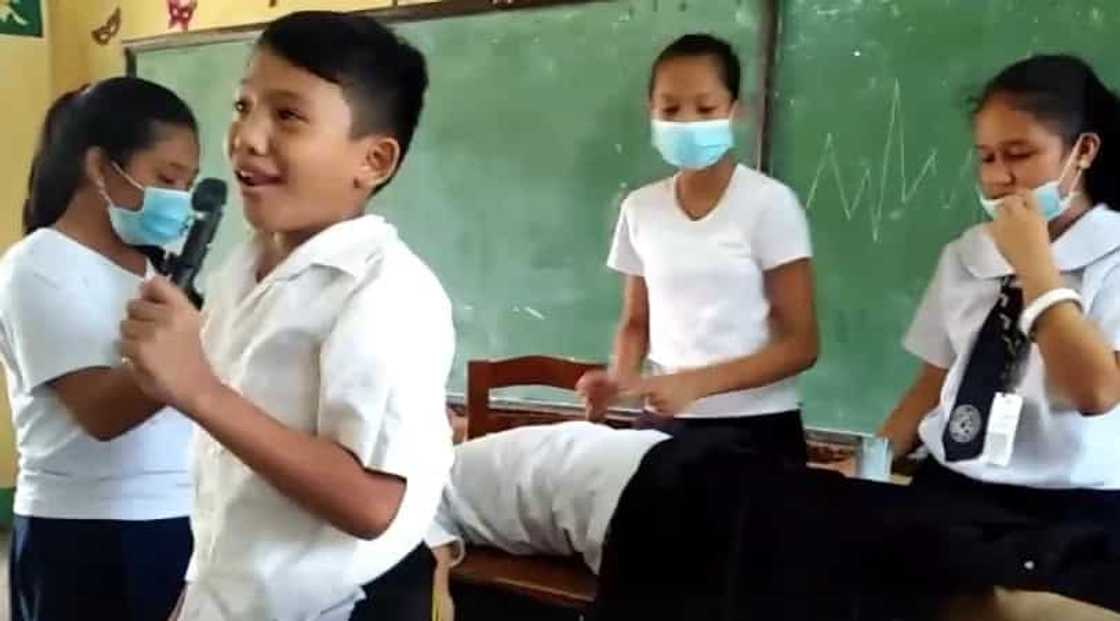 Filipino group of students deliver a funny 'medical' presentation for class Filipino group of students deliver a funny 'medical' presentation for class