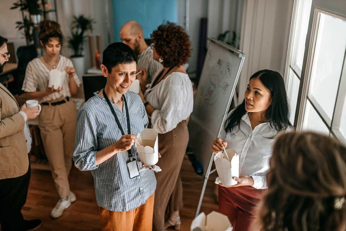 Colleagues interacting in the office Colleagues interacting in the office
