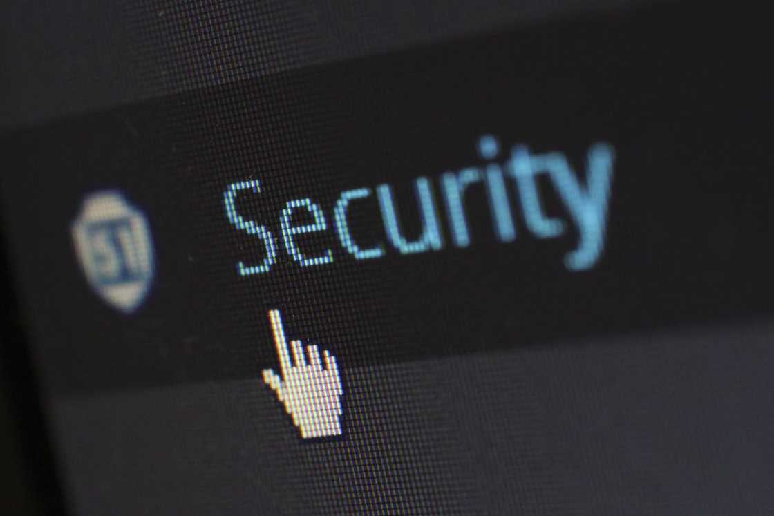 A close-up of a computer screen showing the word "Security" with a cursor hovering over it.