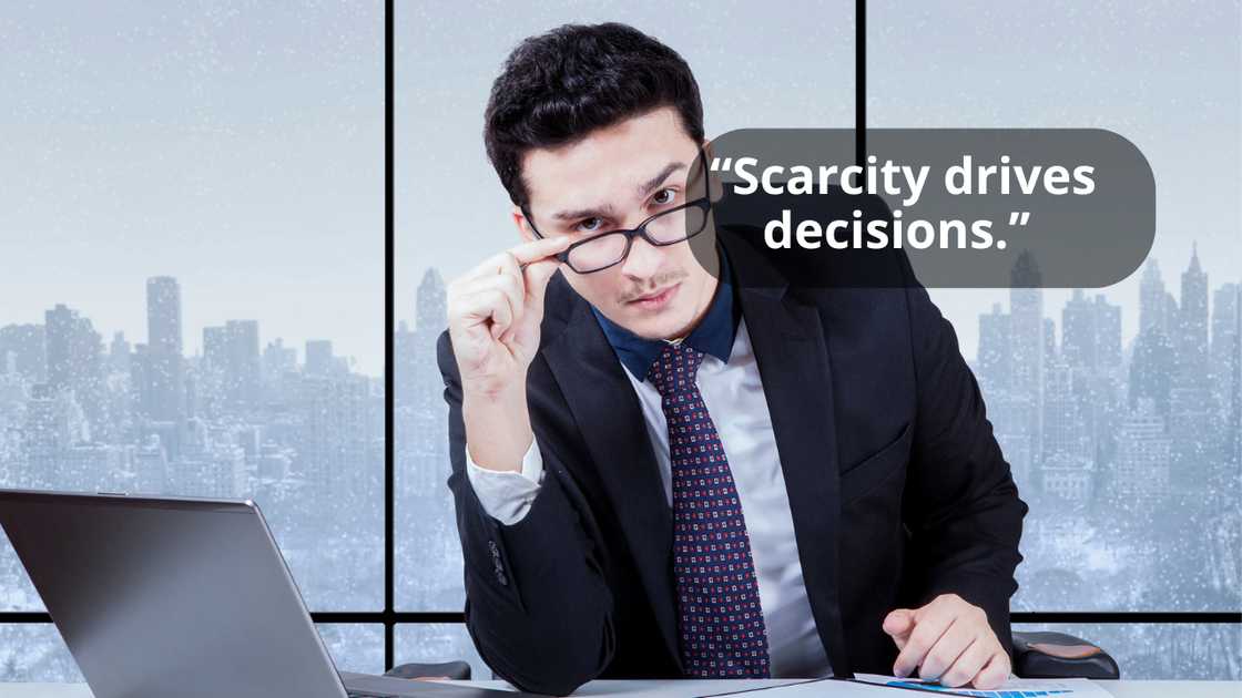 A businessman talking while removing his sunglasses A businessman talking while removing his sunglasses