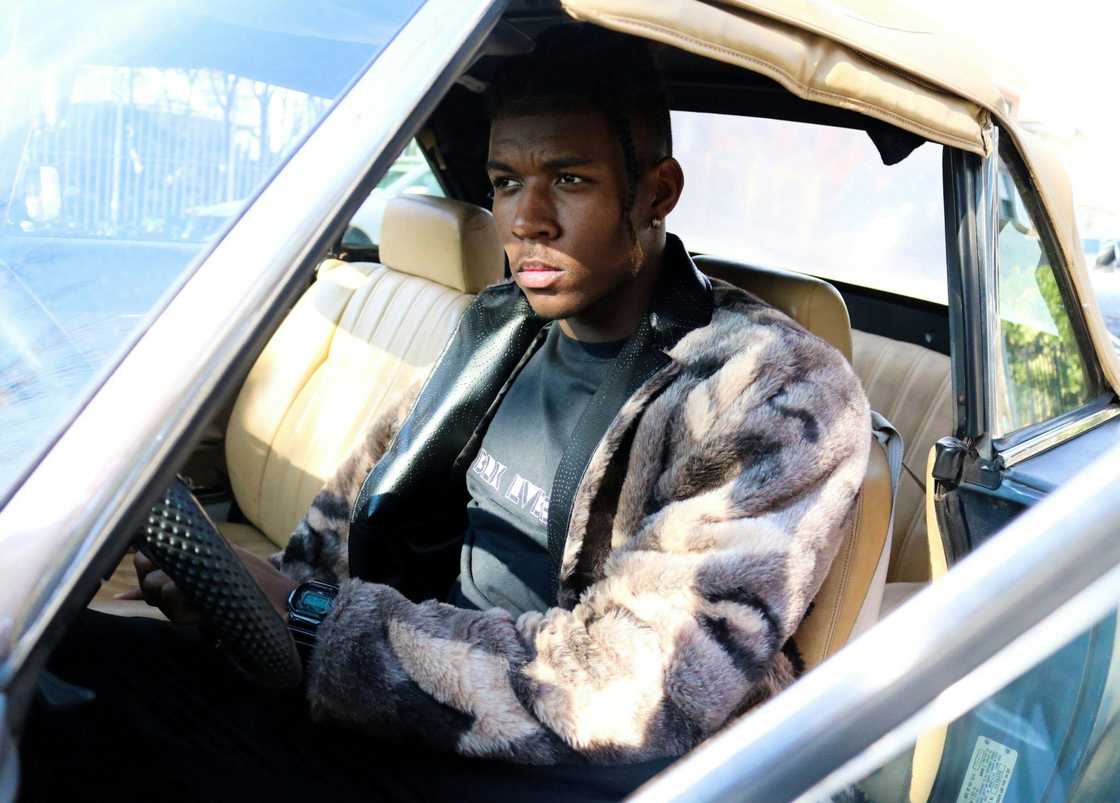 A man in a car A man in a car