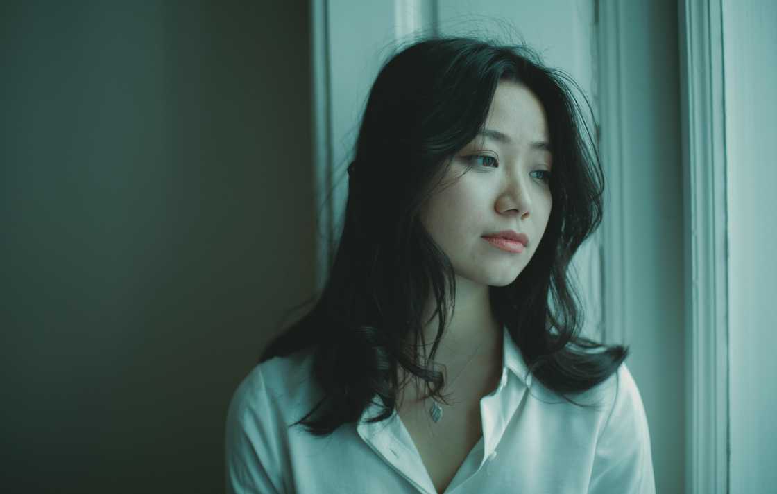 A young woman in deep thoughts