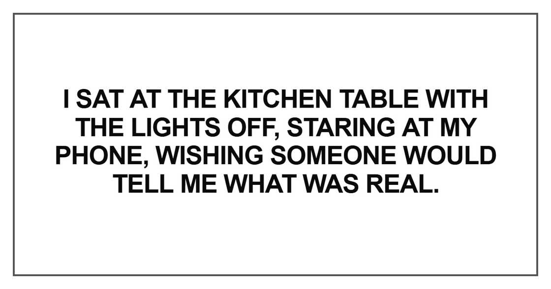 I sat at the kitchen table with the lights off