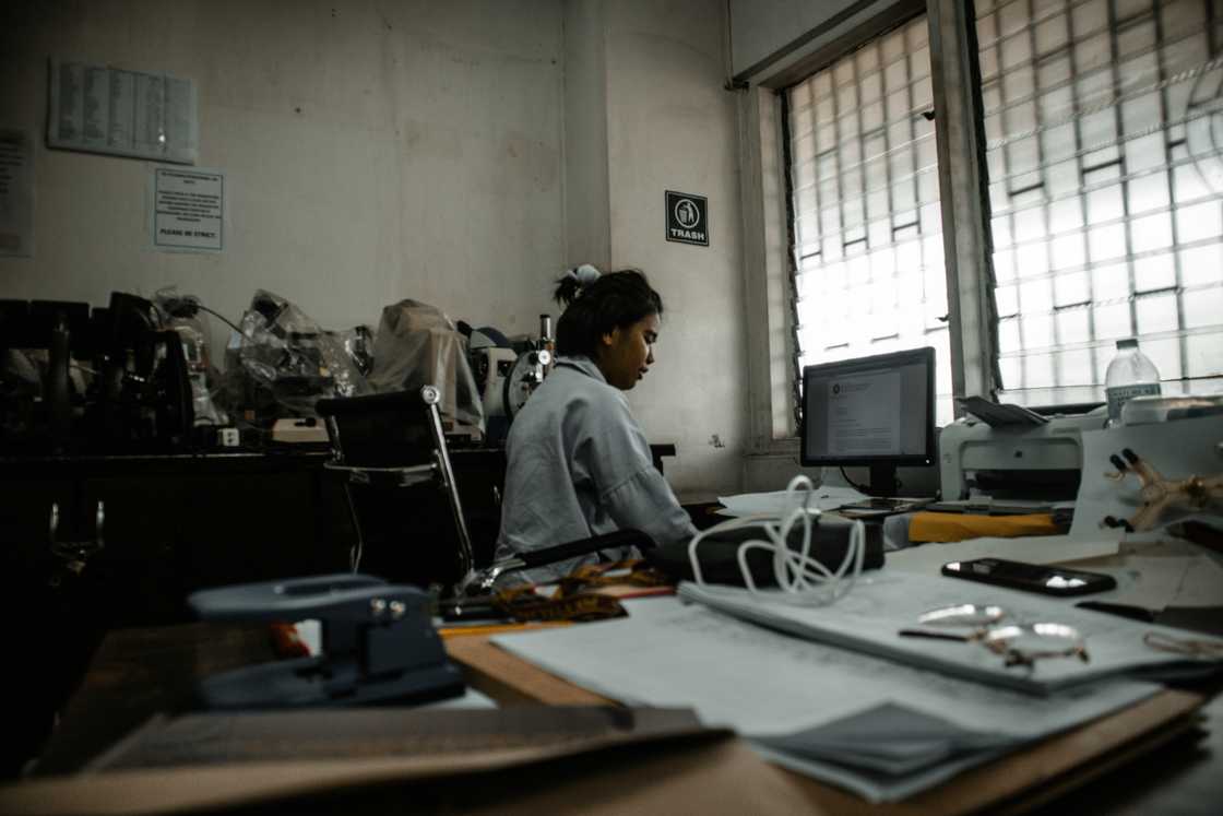 A young exhausted woman in the classroom