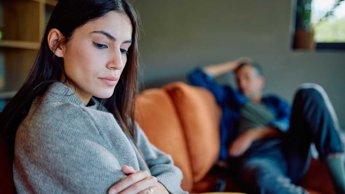 A young adult woman is feeling sad A young adult woman is feeling sad