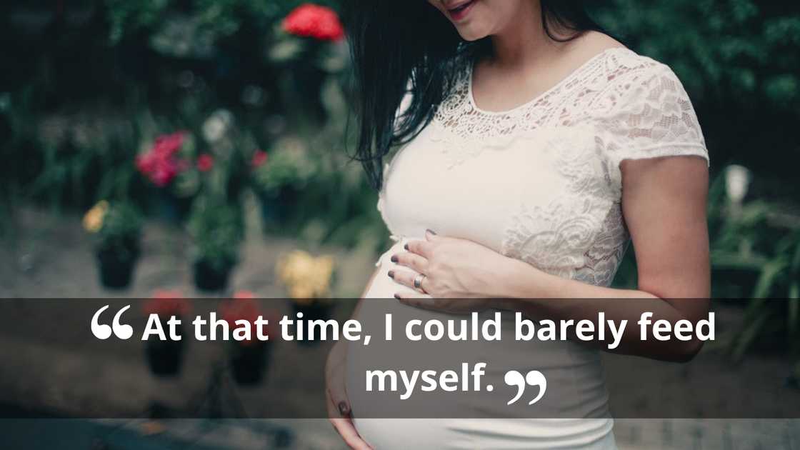 Pregnant woman gently holding her baby bump outdoors. Pregnant woman gently holding her baby bump outdoors.