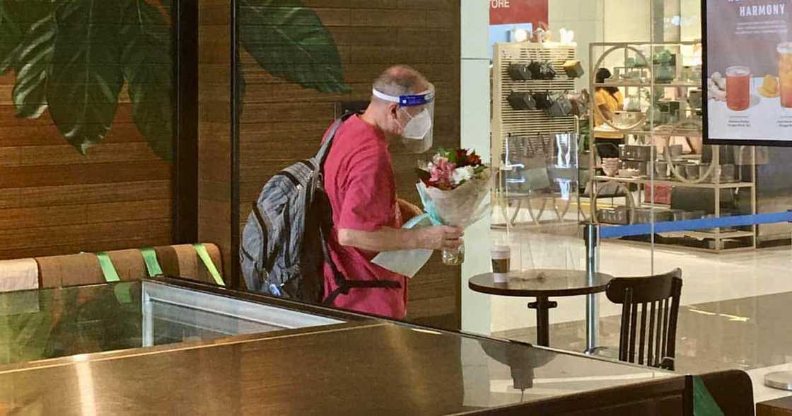 Loyal man patiently waits for wife at coffee shop for Valentine's Day