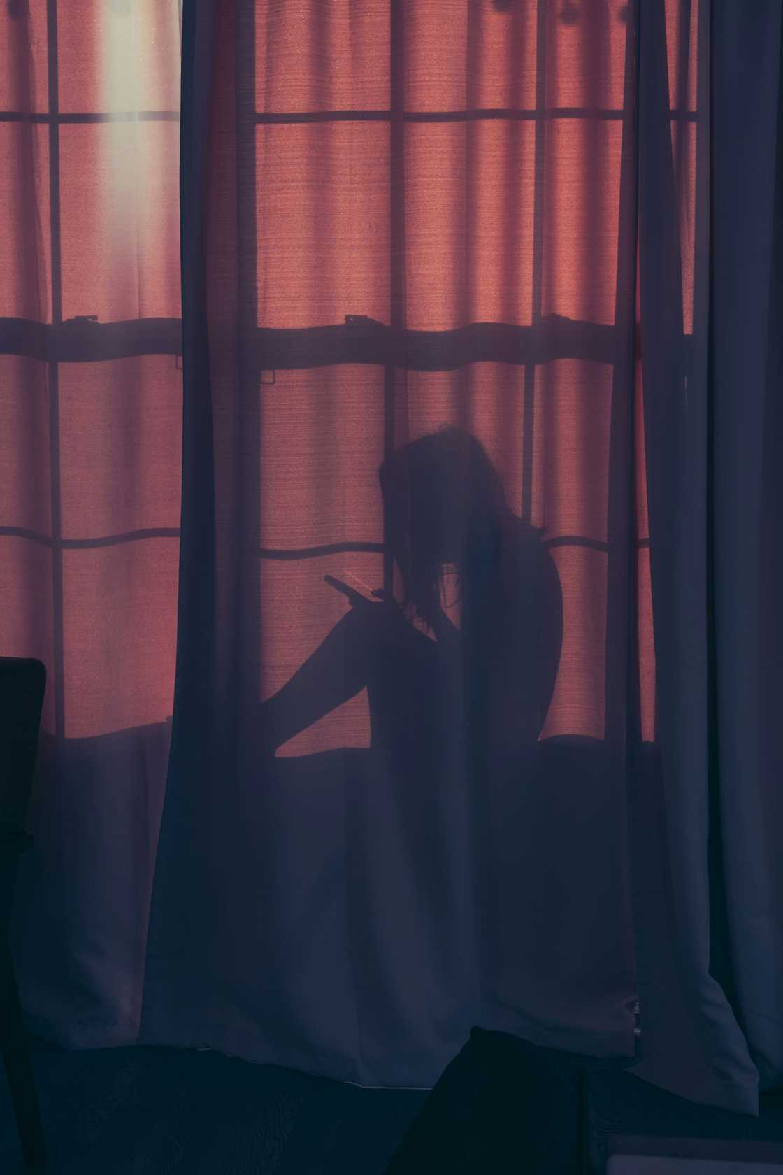 Novels: Silhouette picture of lady on the phone. Novels: Silhouette picture of lady on the phone.