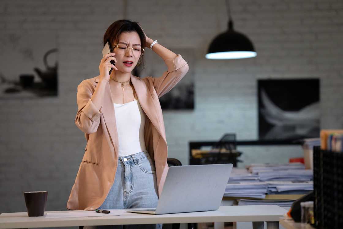 A woman is making a call A woman is making a call