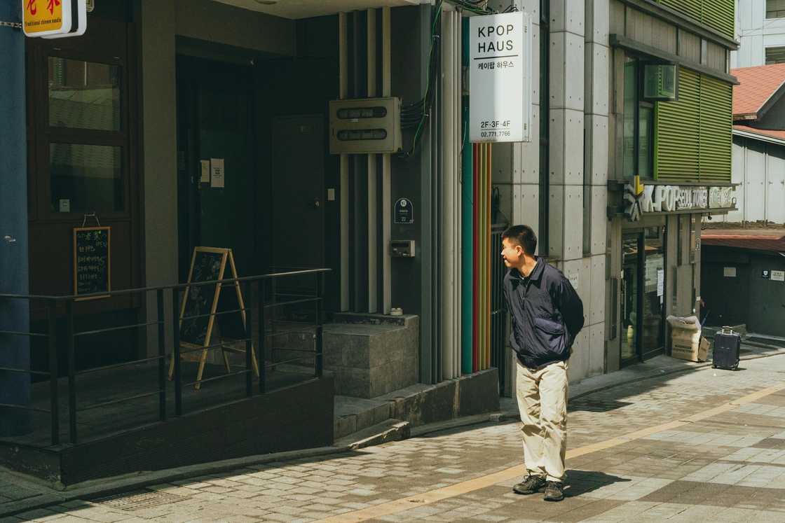 A man walking on the street A man walking on the street