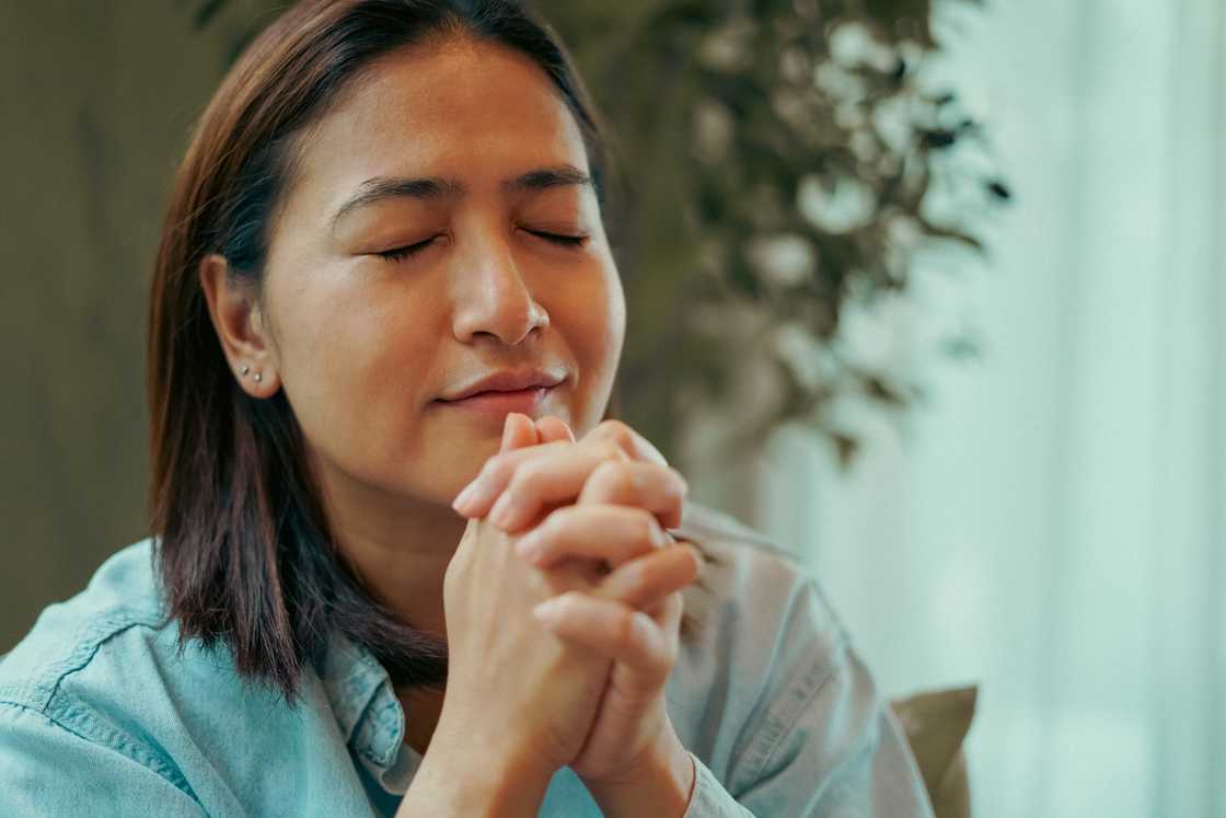 A woman in prayer room