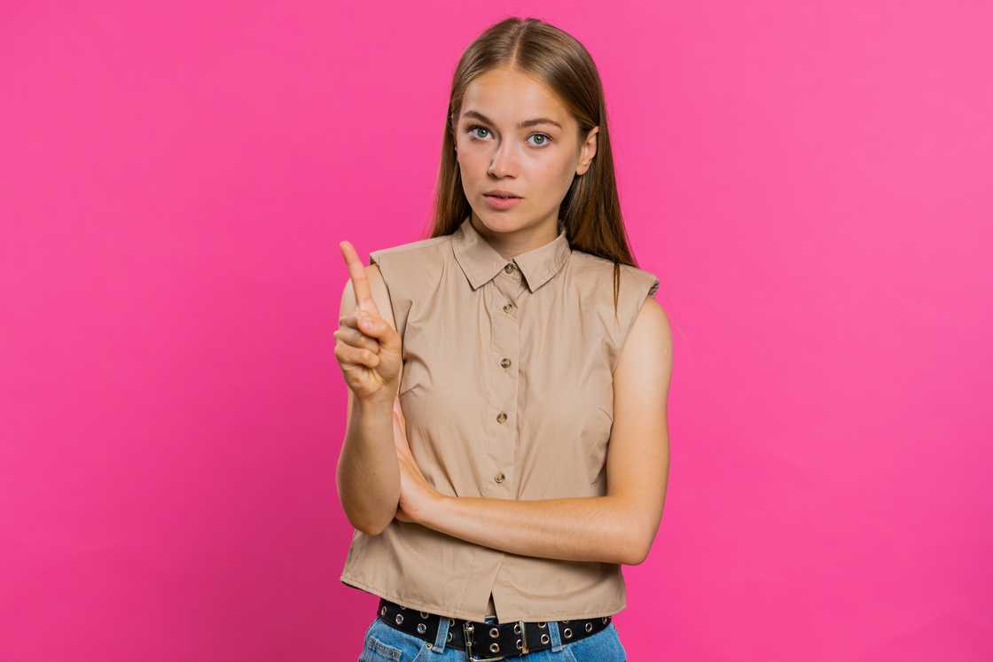 A woman shaking her head -saying no A woman shaking her head -saying no