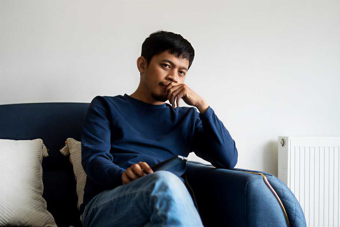 A stressed Asian man