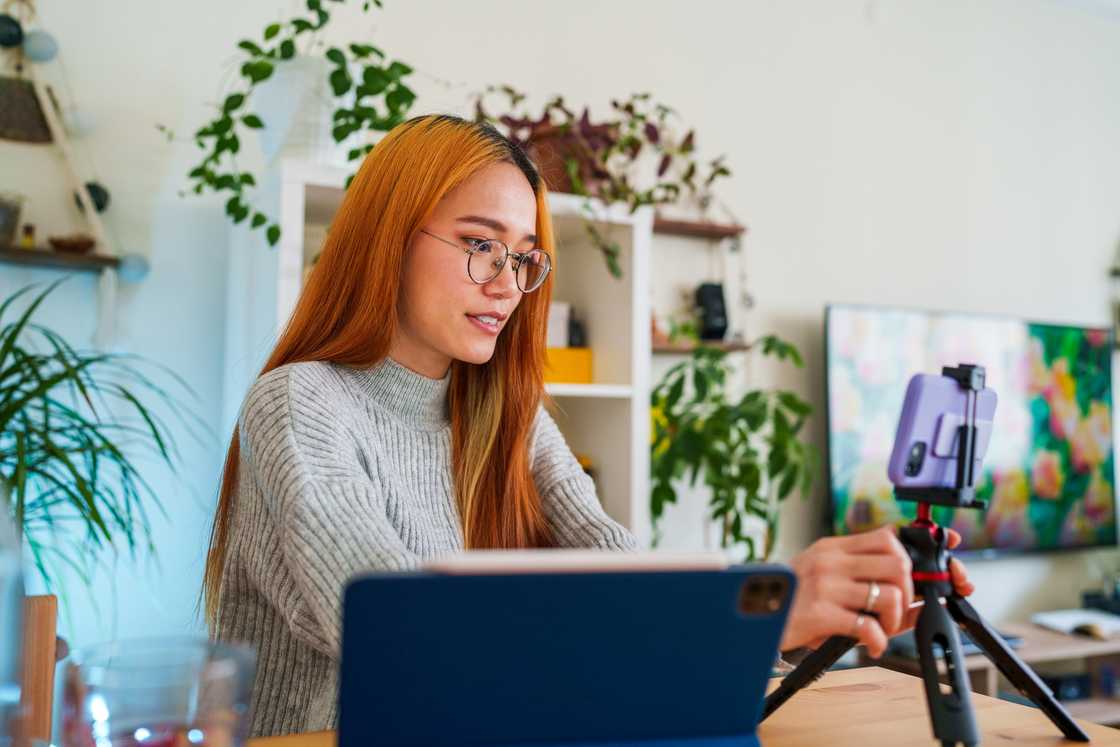 A lady is filming A lady is filming