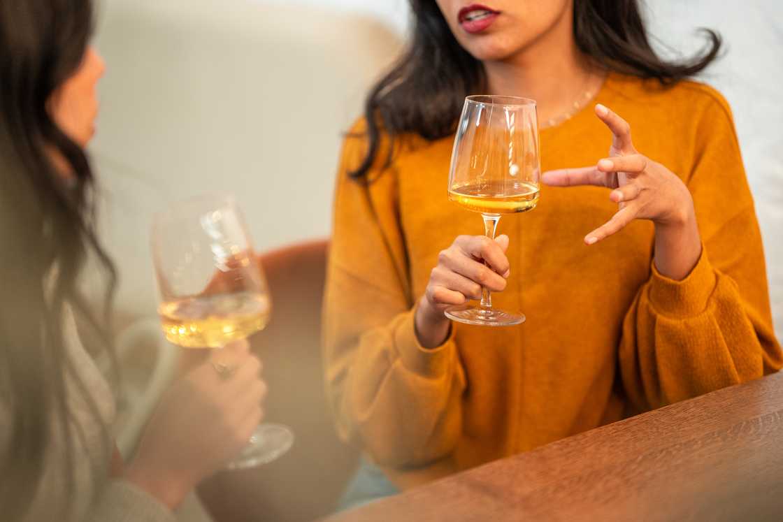 Two ladies at a restaurant having wine Two ladies at a restaurant having wine