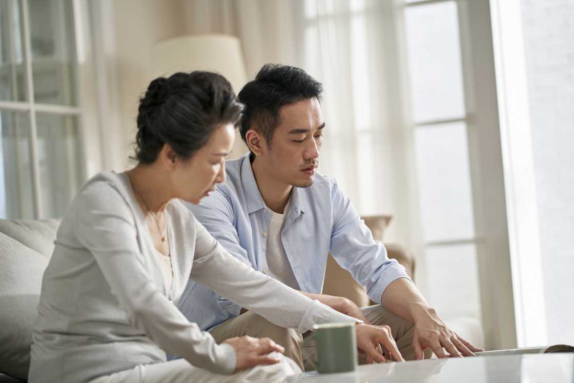 A mother talking to her son-in-law