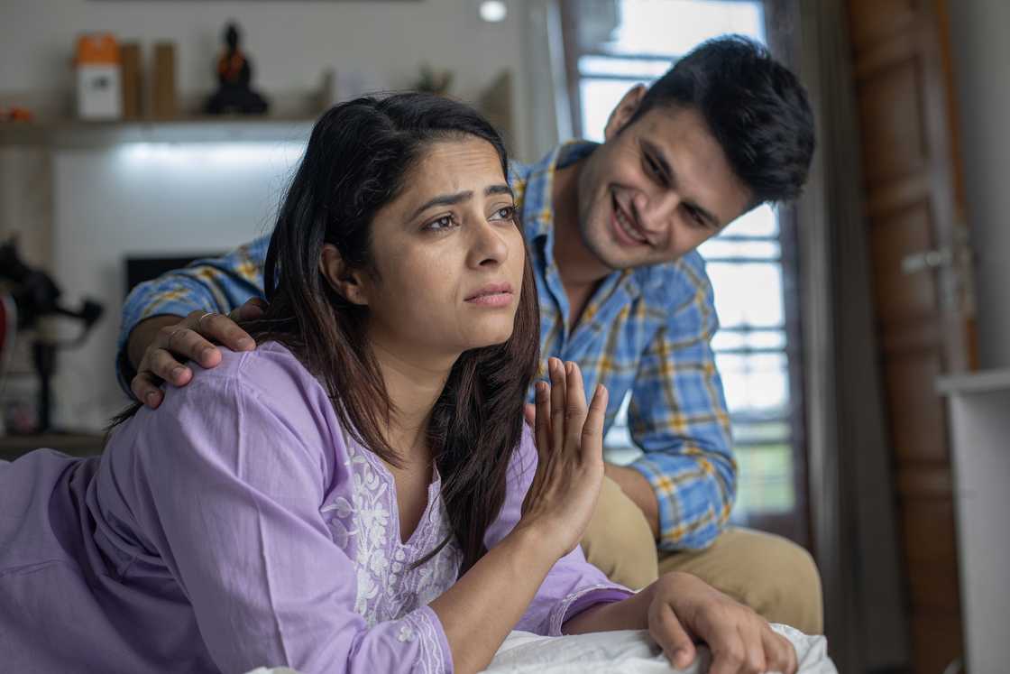 A man apologises to his ex-wife