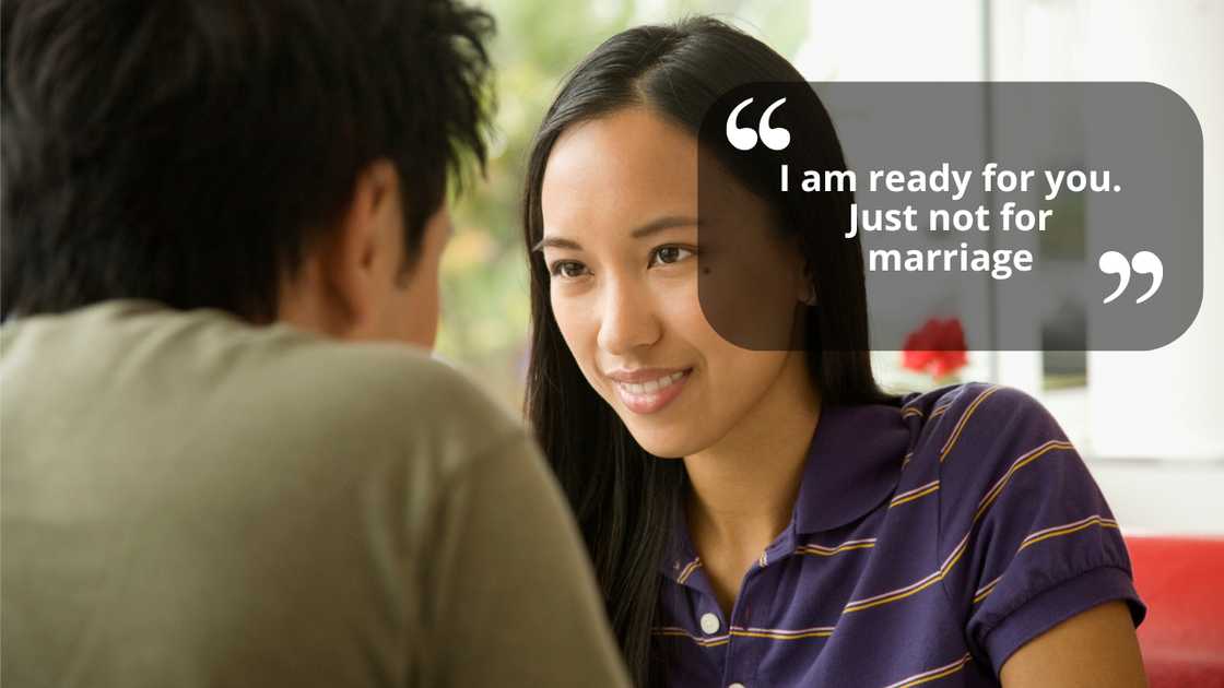 A couple talking at a coffee shop