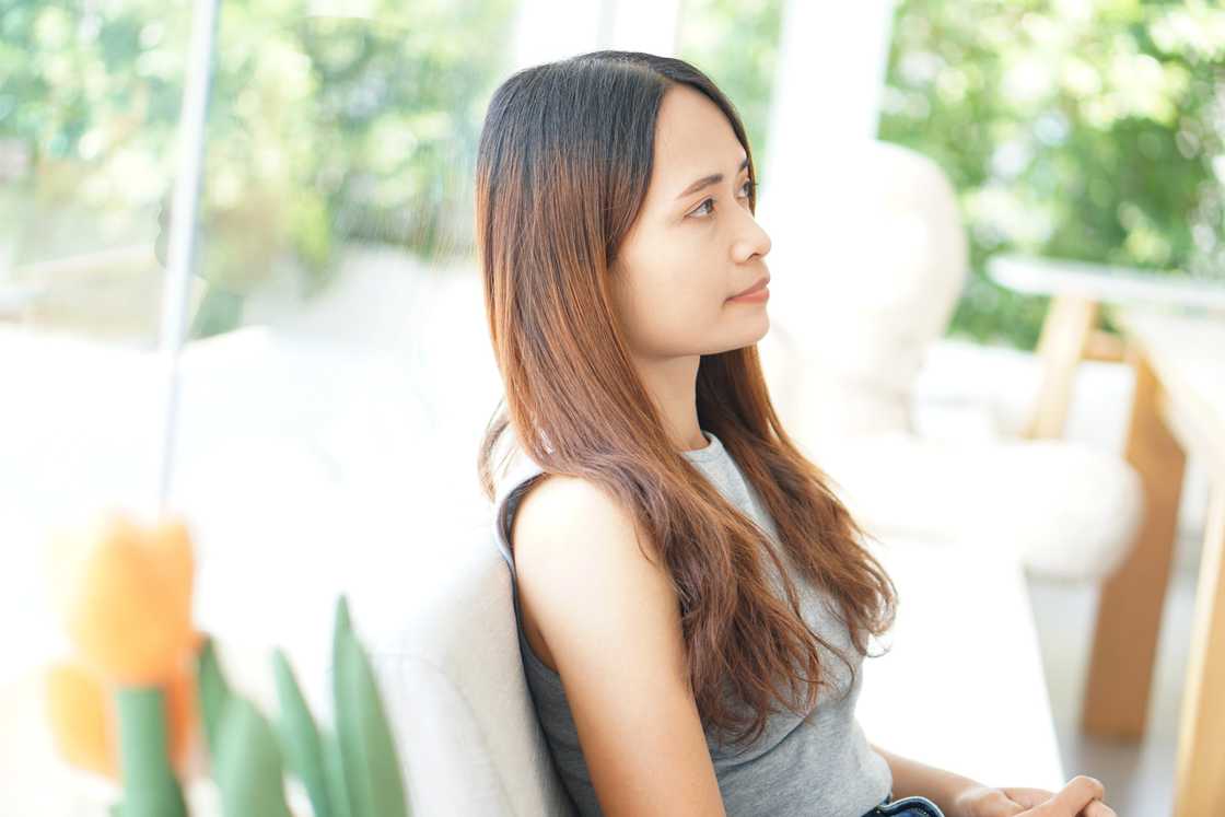 A woman feeling happy and stress free