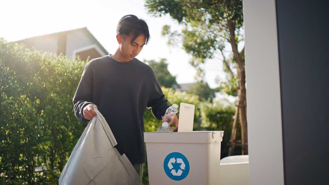 A man takes out trash