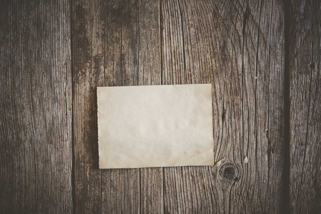 A letter on a wooden surface A letter on a wooden surface