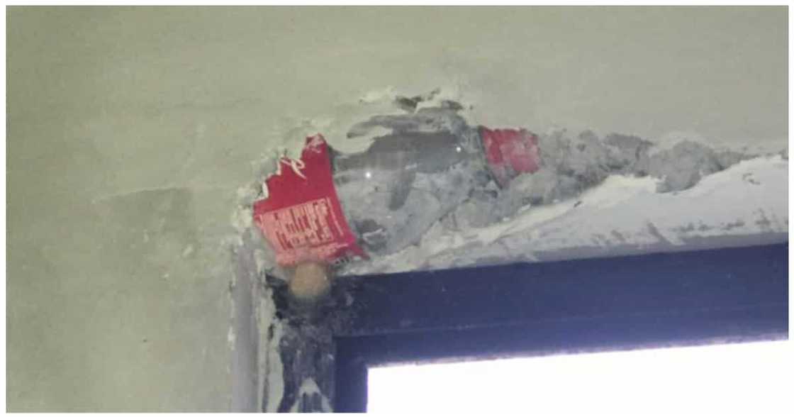 Homeowner, nawindang sa bote ng softdrink na natagpuang nakabaon sa pader