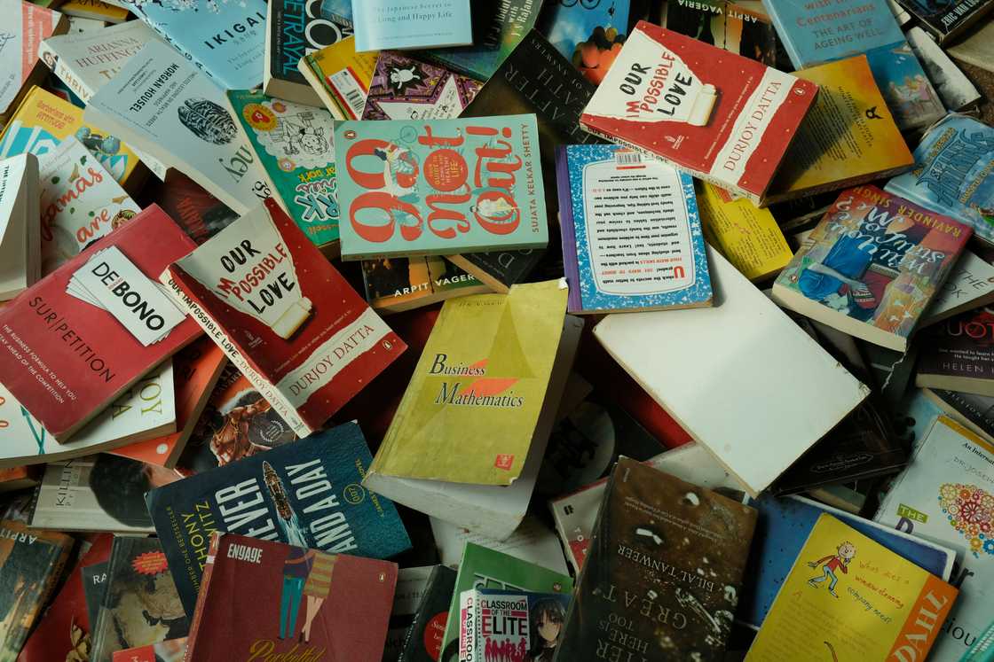Books dispersed on he floor Books dispersed on he floor
