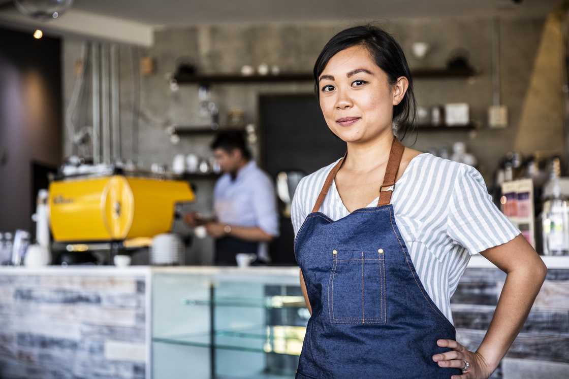 A female coffeshop owner A female coffeshop owner