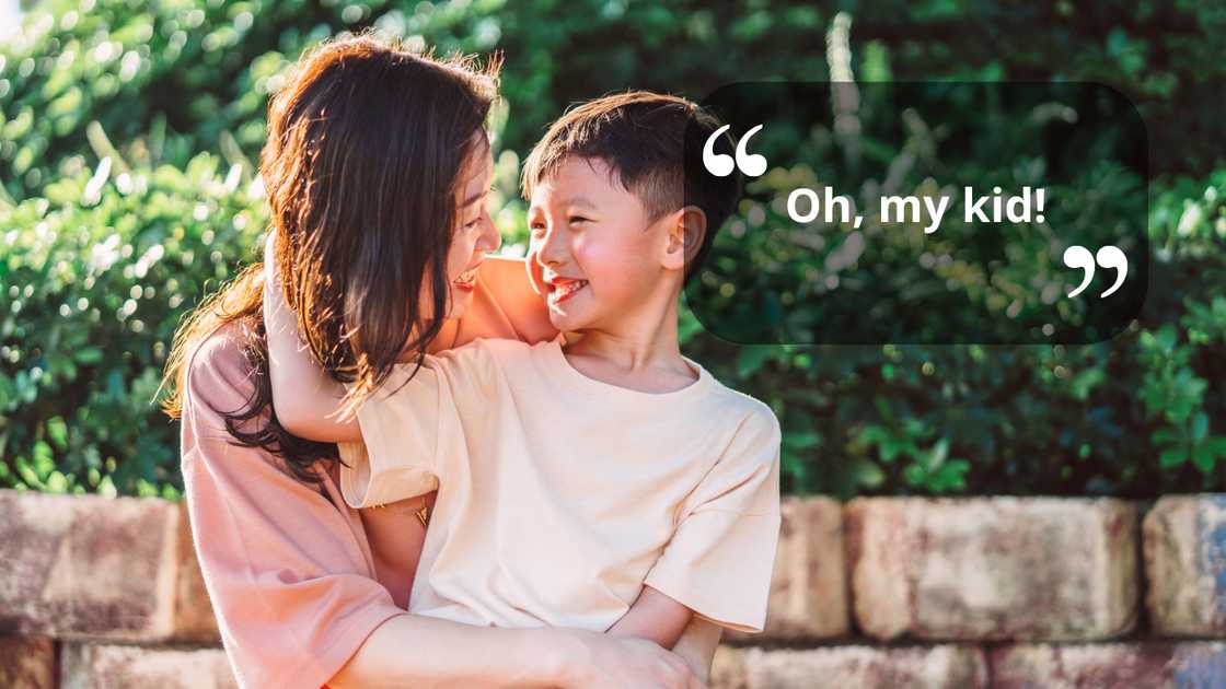 A mother embracing her son A mother embracing her son