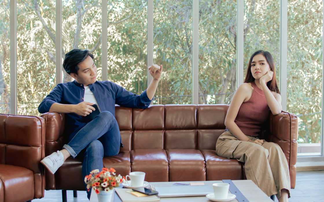 Novels Couple struggling to resolve their issues at lawyer's office. Novels Couple struggling to resolve their issues at lawyer's office.