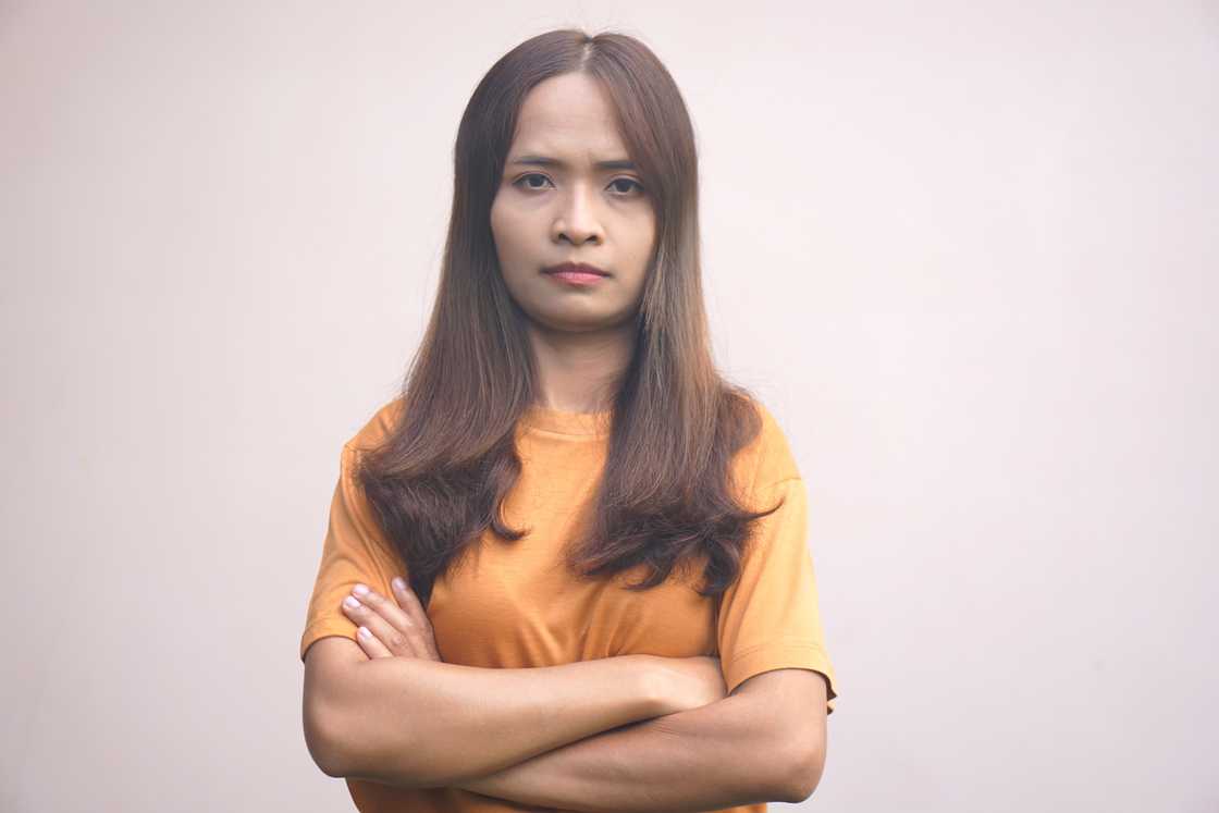 A woman folding her hands