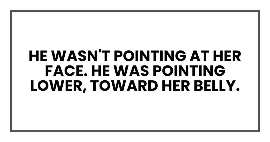 He wasn't pointing at her face. He was pointing lower, toward her belly.