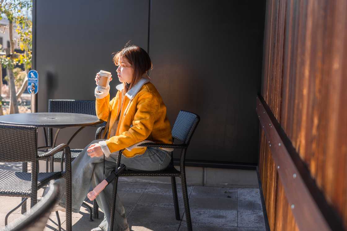 A lonely lady at a cafe A lonely lady at a cafe