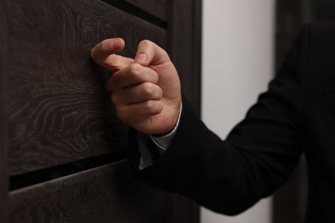 A man knocks the door